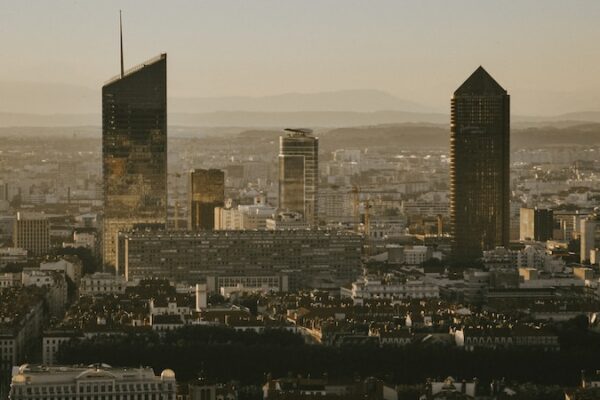 city skyline under white sky during daytime