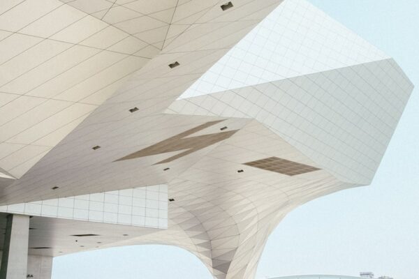 white concrete building under blue sky at daytime